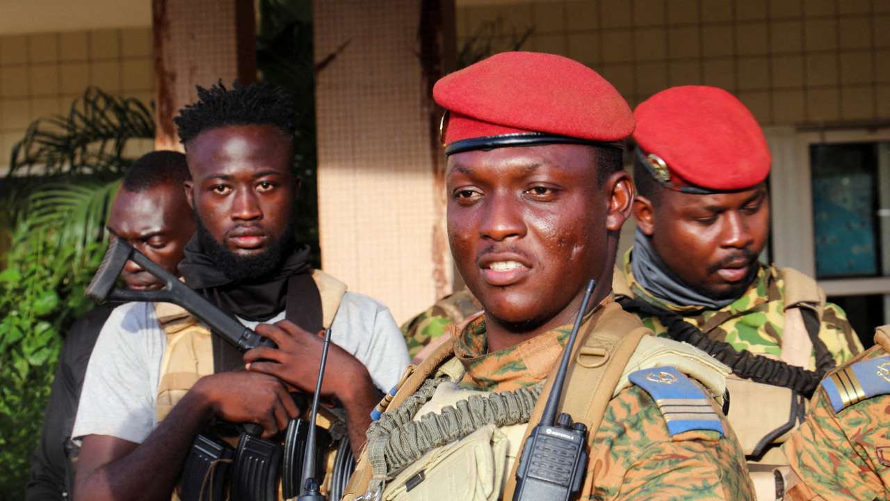 FILE PHOTO: Burkina Faso's new military leader Ibrahim Traore is escorted by soldiers in Ouagadougou, Burkina Faso October 2, 2022. REUTERS/Vincent Bado/File Photo