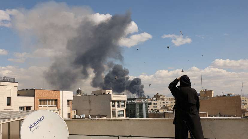 Smoke rises following an explosion, after Israel and the U.S. launched strikes on Iran, in Tehran