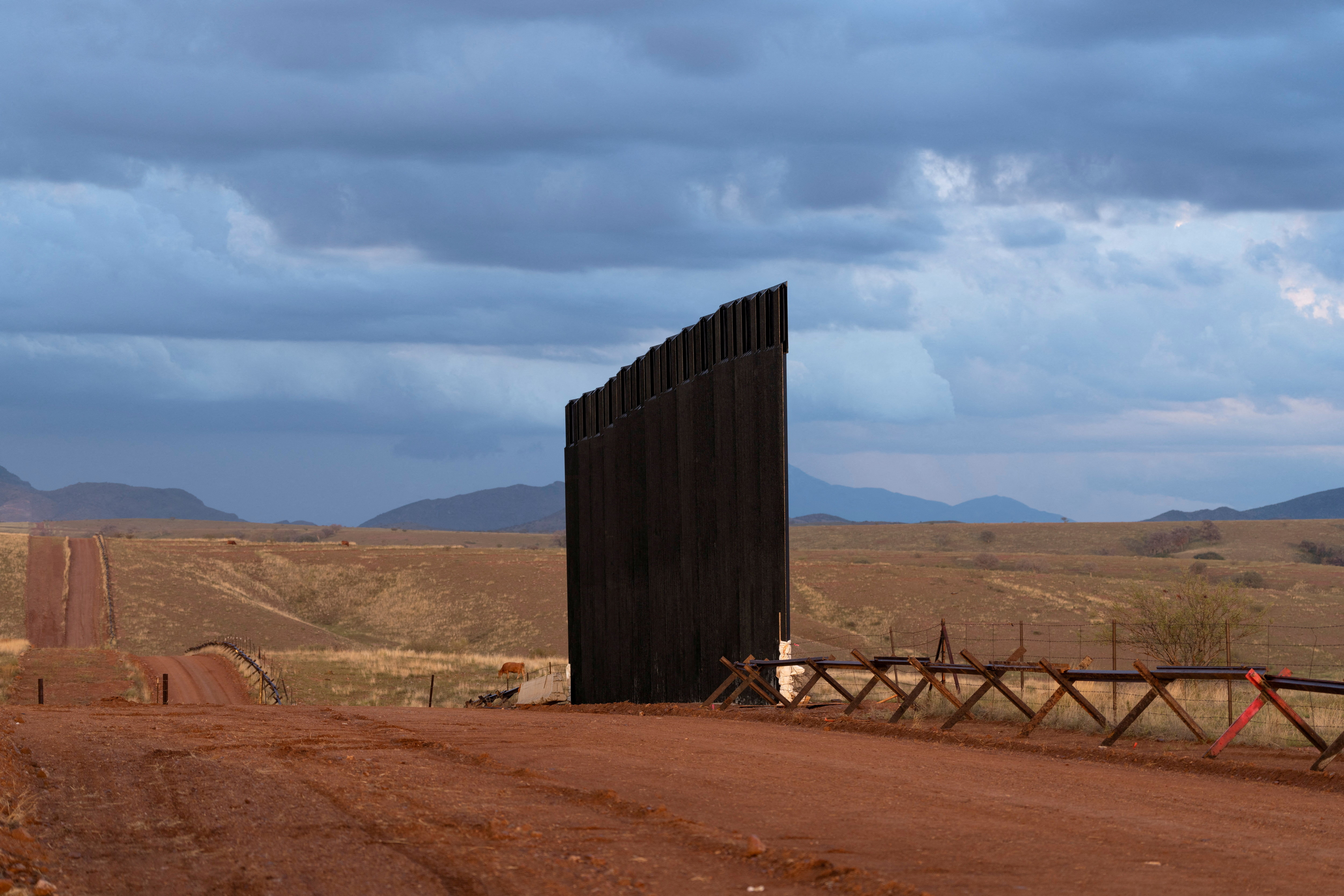 FILE PHOTO: A new section of border wall stands in Arizona's San Rafael Valley in Santa Cruz County