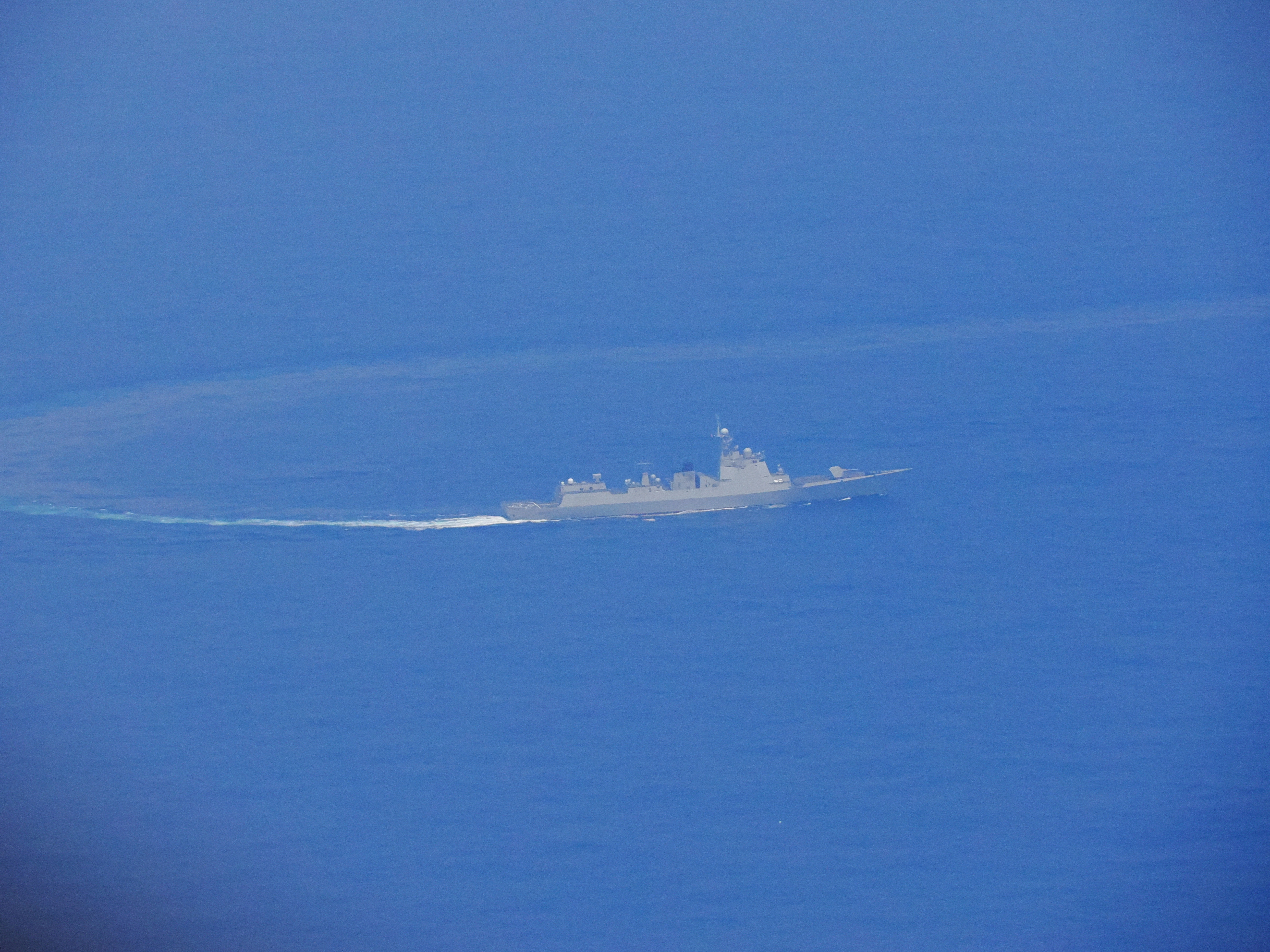A Chinese warship is pictured while navigating at an undisclosed location in waters around Taiwan