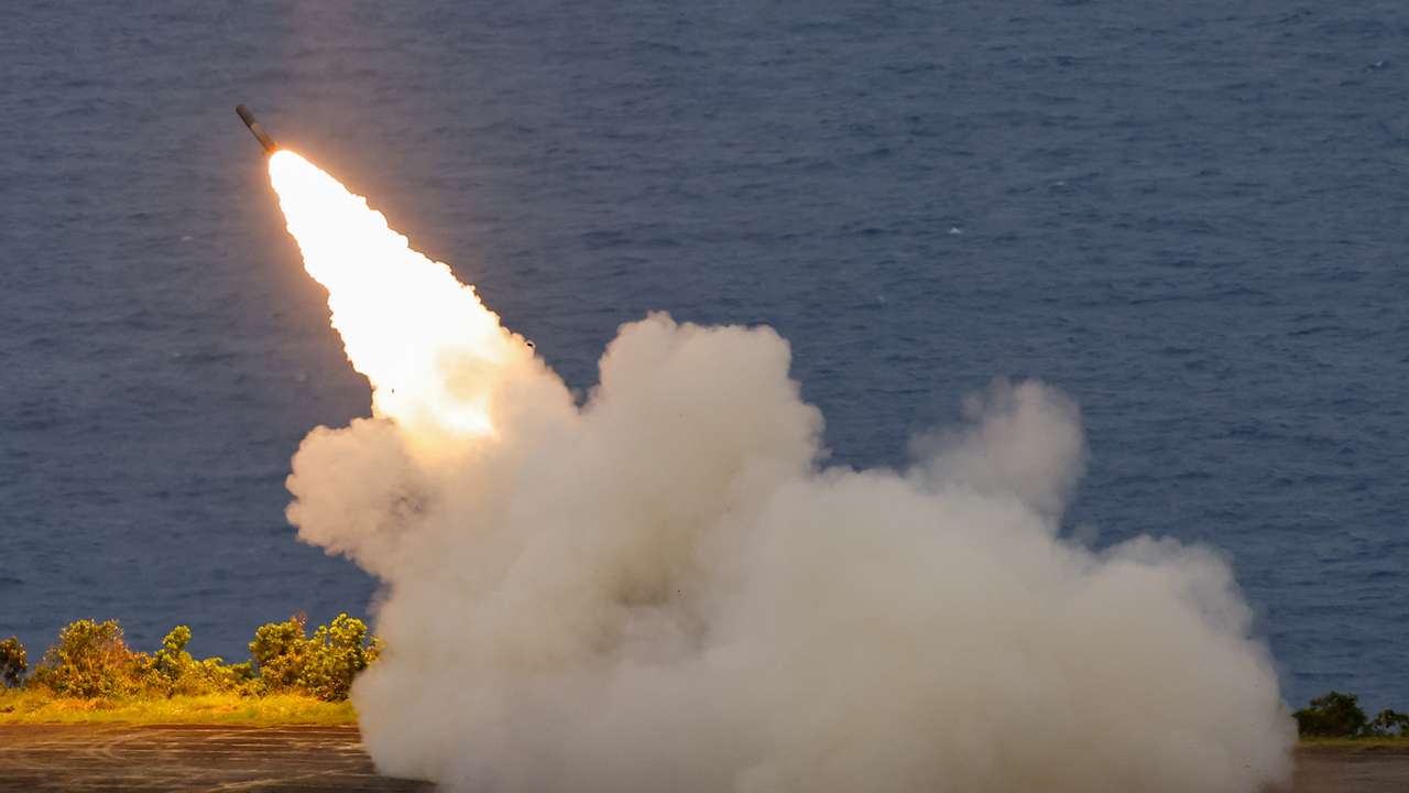 The Taiwanese military conducts its first High Mobility Artillery Rocket System (HIMARS) live-fire test launch at the Jiupeng base in Pingtung