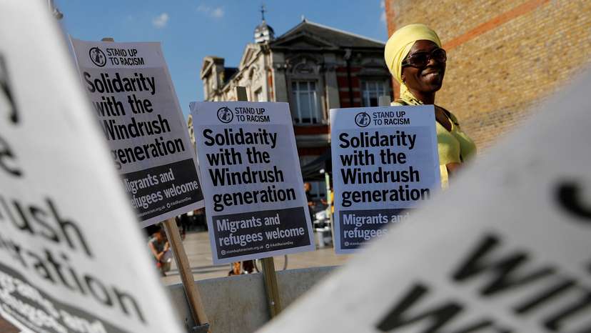 FILE PHOTO: A woman attends an event in Windrush Square to show solidarity with the Windrush generation in the Brixton district of London