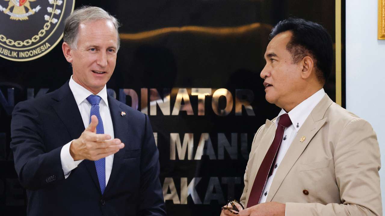 Indonesia's Chief Minister for Law and Human Rights, Yusril Ihza Mahendra and Marc Gerritsen, Dutch Ambassador to Indonesia, attend a meeting in Jakarta