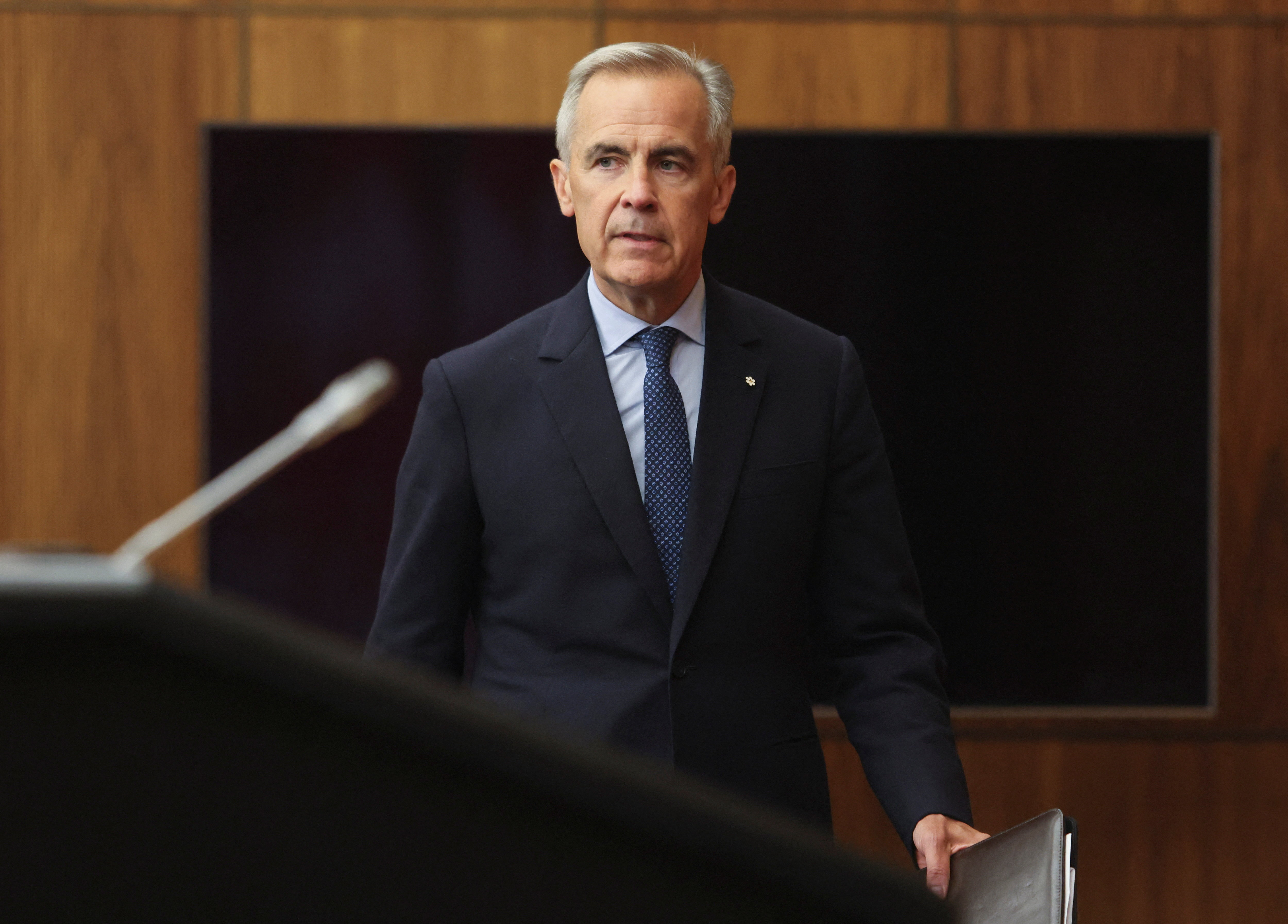 Canada's Prime Minister Mark Carney arrives at a press conference to make an announcement on recognizing Palestinian statehood, in Ottawa
