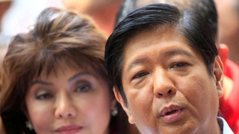 FILE PHOTO: Ferdinand "Bongbong" Marcos and his sister Imee, children of late dictator Ferdinand Marcos, answer questions during a press briefing at the Supreme Court in Padre Faura