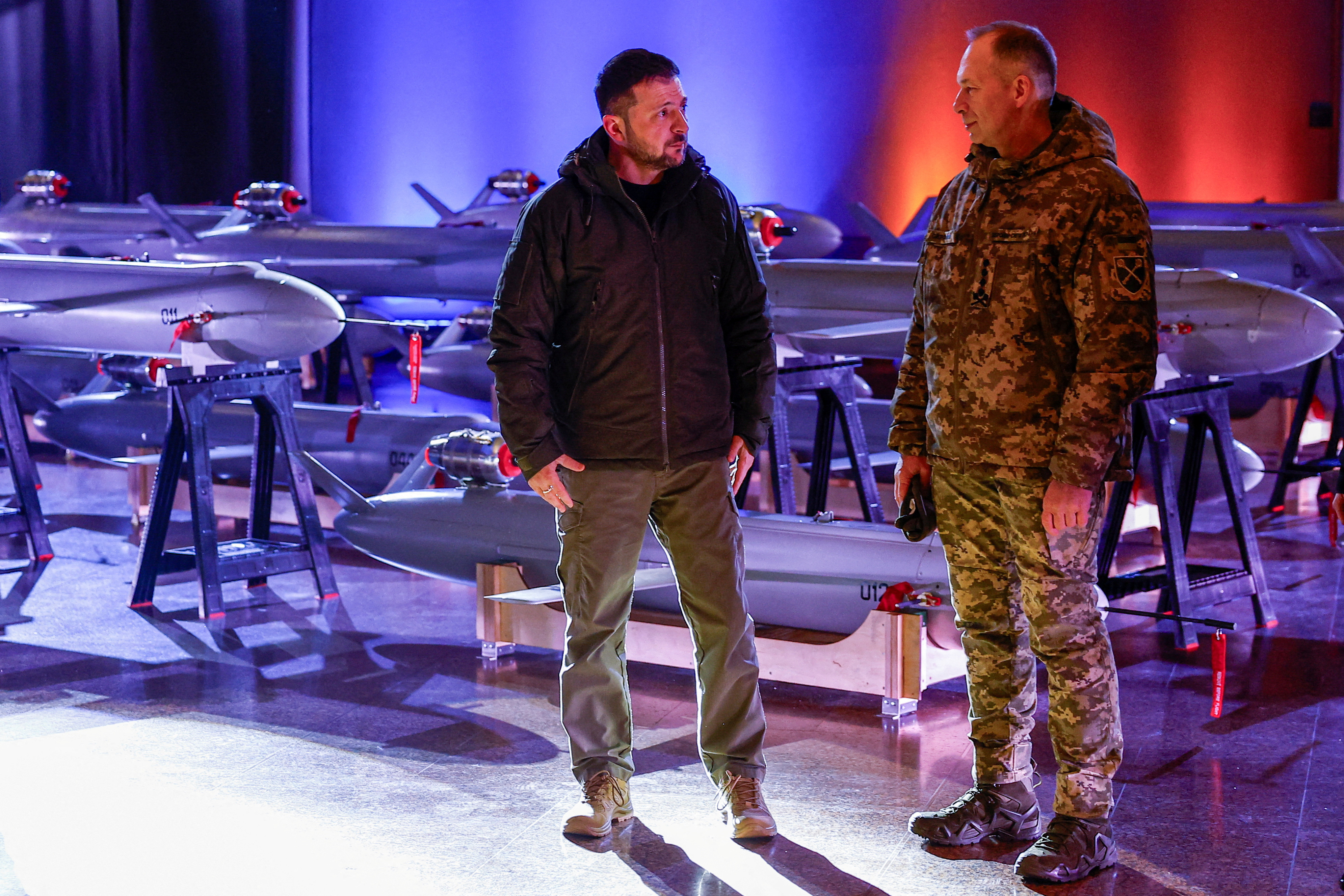 FILE PHOTO: Ukraine's President Zelenskiy and Commander in Chief of the UAF Syrskyi visit an exhibition of new Ukrainian made drone-missiles Peklo in Kyiv