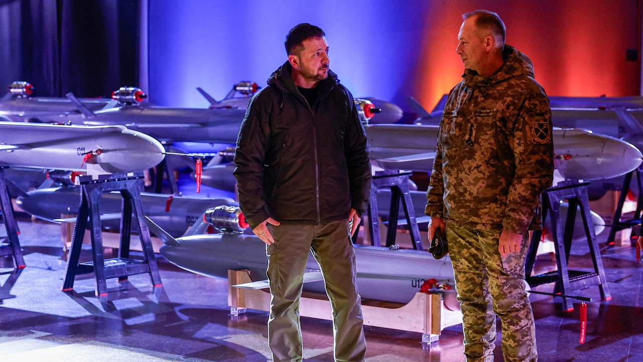 FILE PHOTO: Ukraine's President Zelenskiy and Commander in Chief of the UAF Syrskyi visit an exhibition of new Ukrainian made drone-missiles Peklo in Kyiv