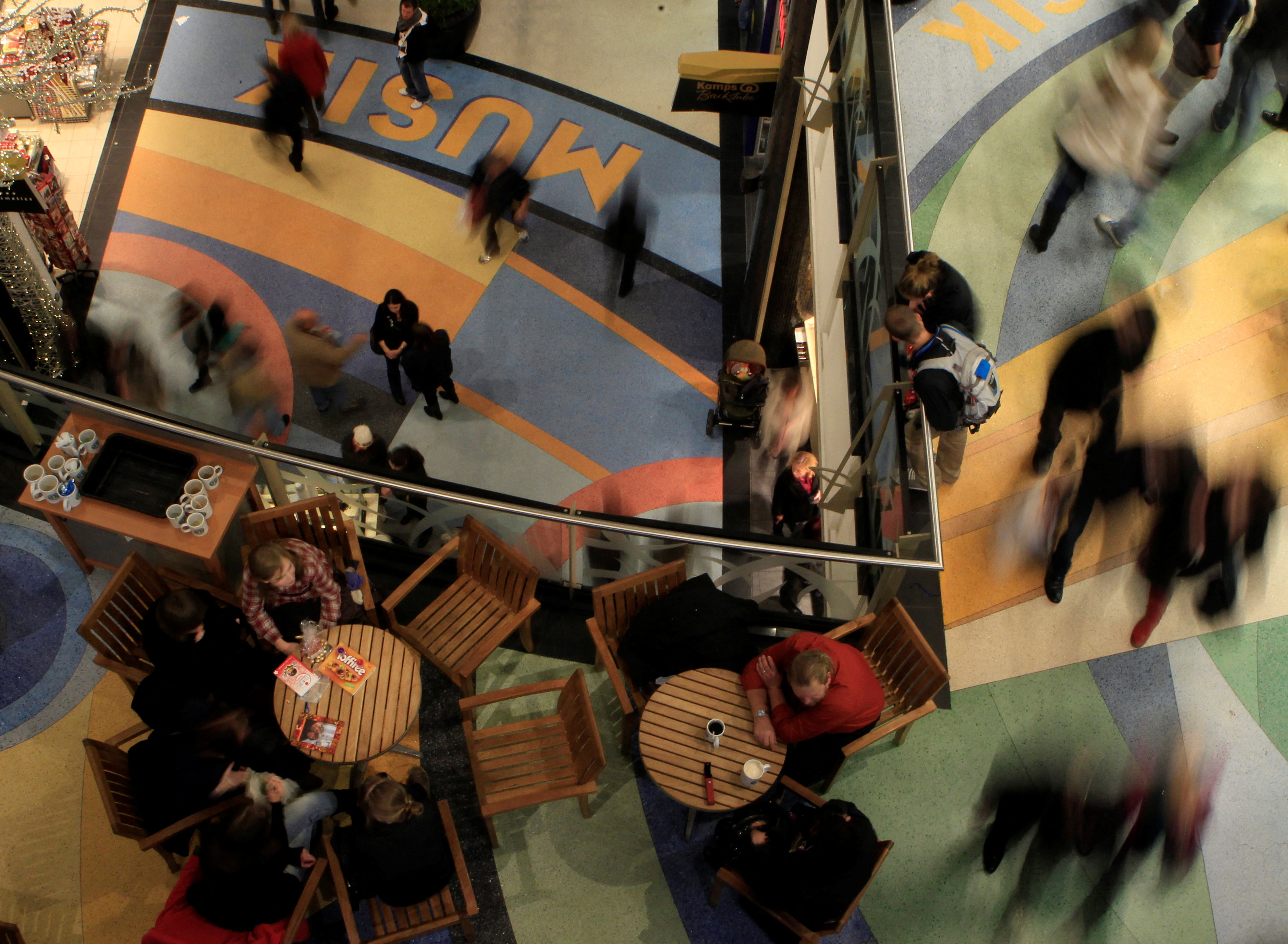 FILE PHOTO: People walk in Alexa shopping centre as Christmas shopping season starts in Berlin