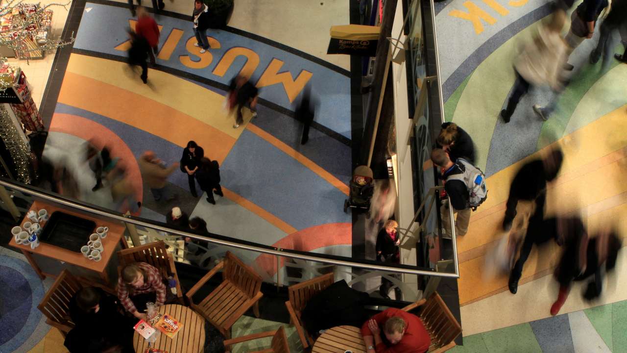 FILE PHOTO: People walk in Alexa shopping centre as Christmas shopping season starts in Berlin