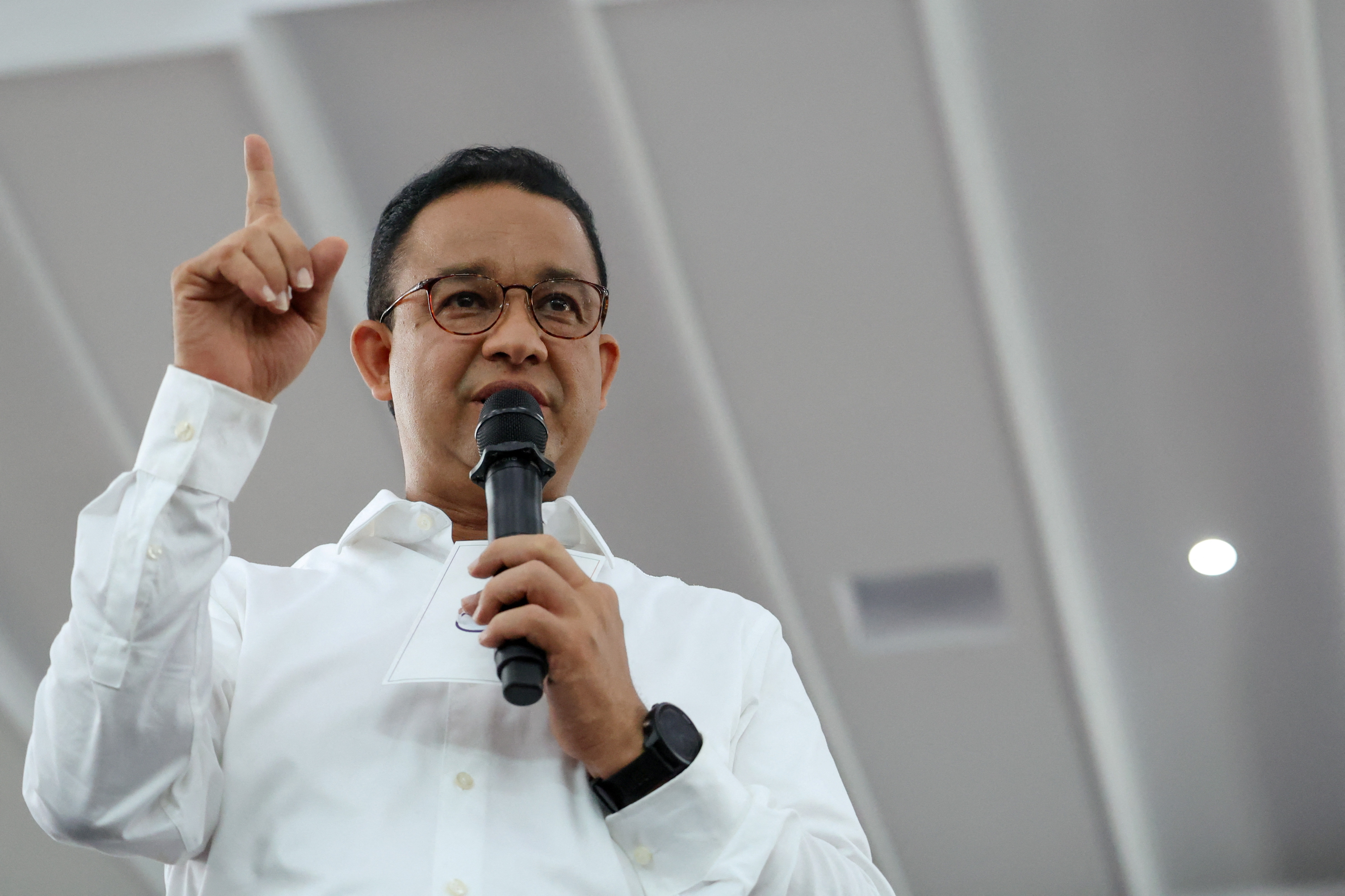 Former Jakarta Governor and presidential candidate Anies Baswedan gestures during his campaign in Ciamis