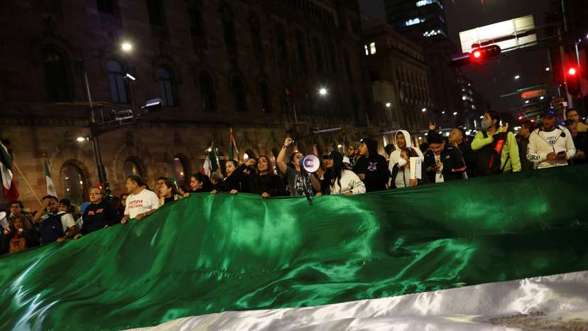 People protest as Mexico's Senate debates a highly contested proposal on a judicial reform, in Mexico City