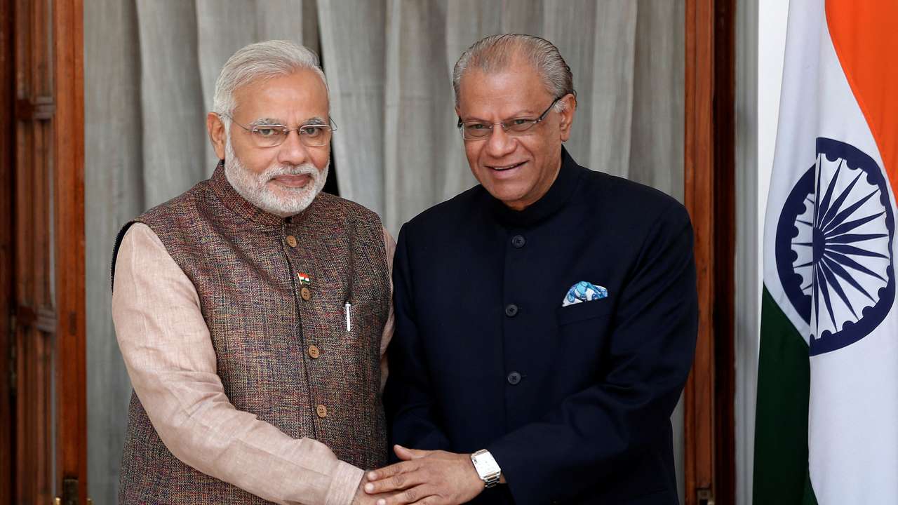 FILE PHOTO: India's PM Modi shakes hands with his Mauritian counterpart Ramgoolam before the start of their bilateral meeting in New Delhi