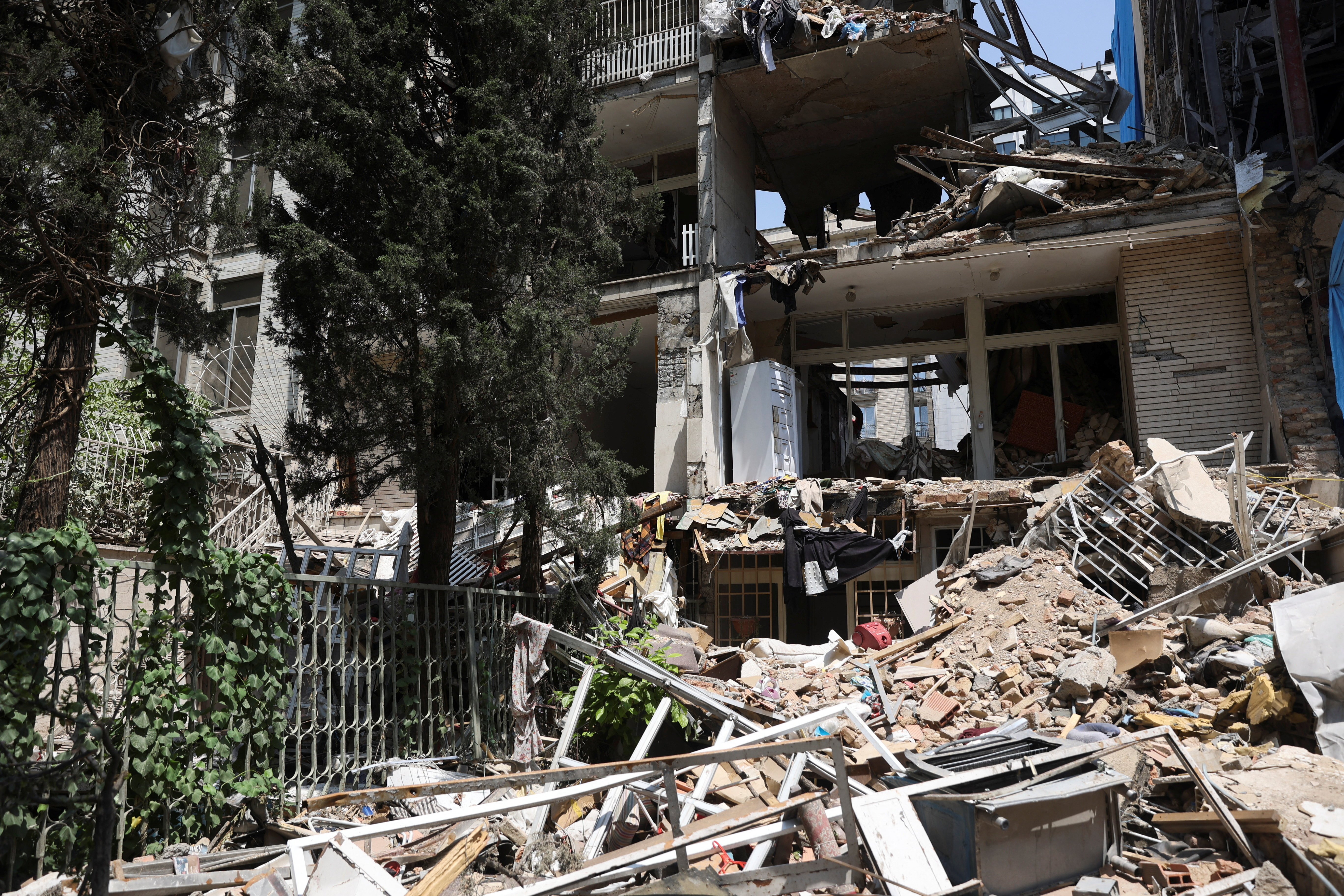 A view shows the damages of a residential building after the Israeli attacks on June, in Tehran