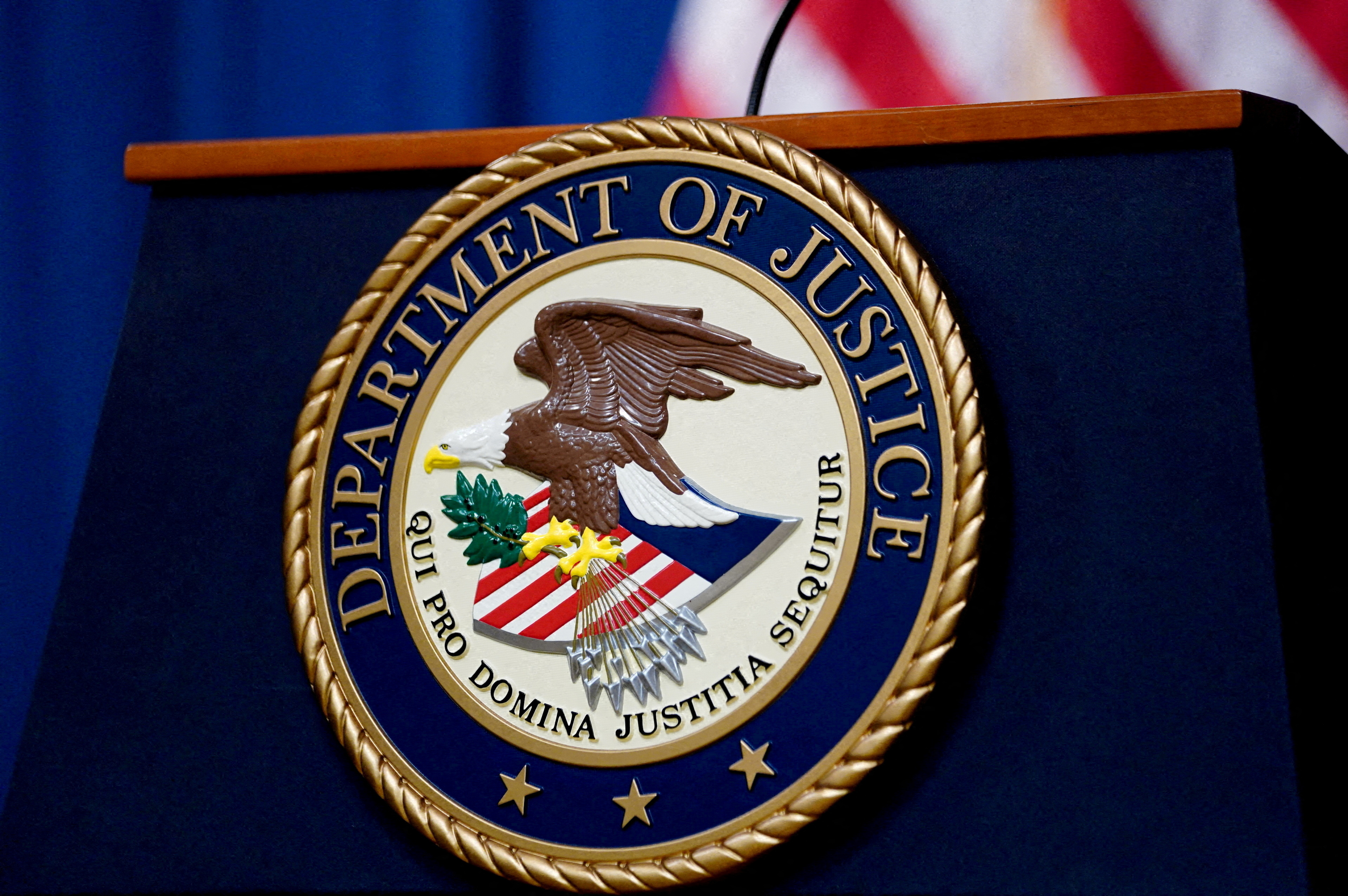 FILE PHOTO: U.S. Justice Department seal is seen at Justice Department headquarters in Washington
