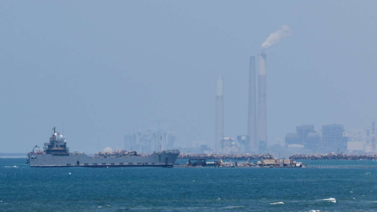 Temporary floating pier anchored by the U.S. to boost aid deliveries to Gaza