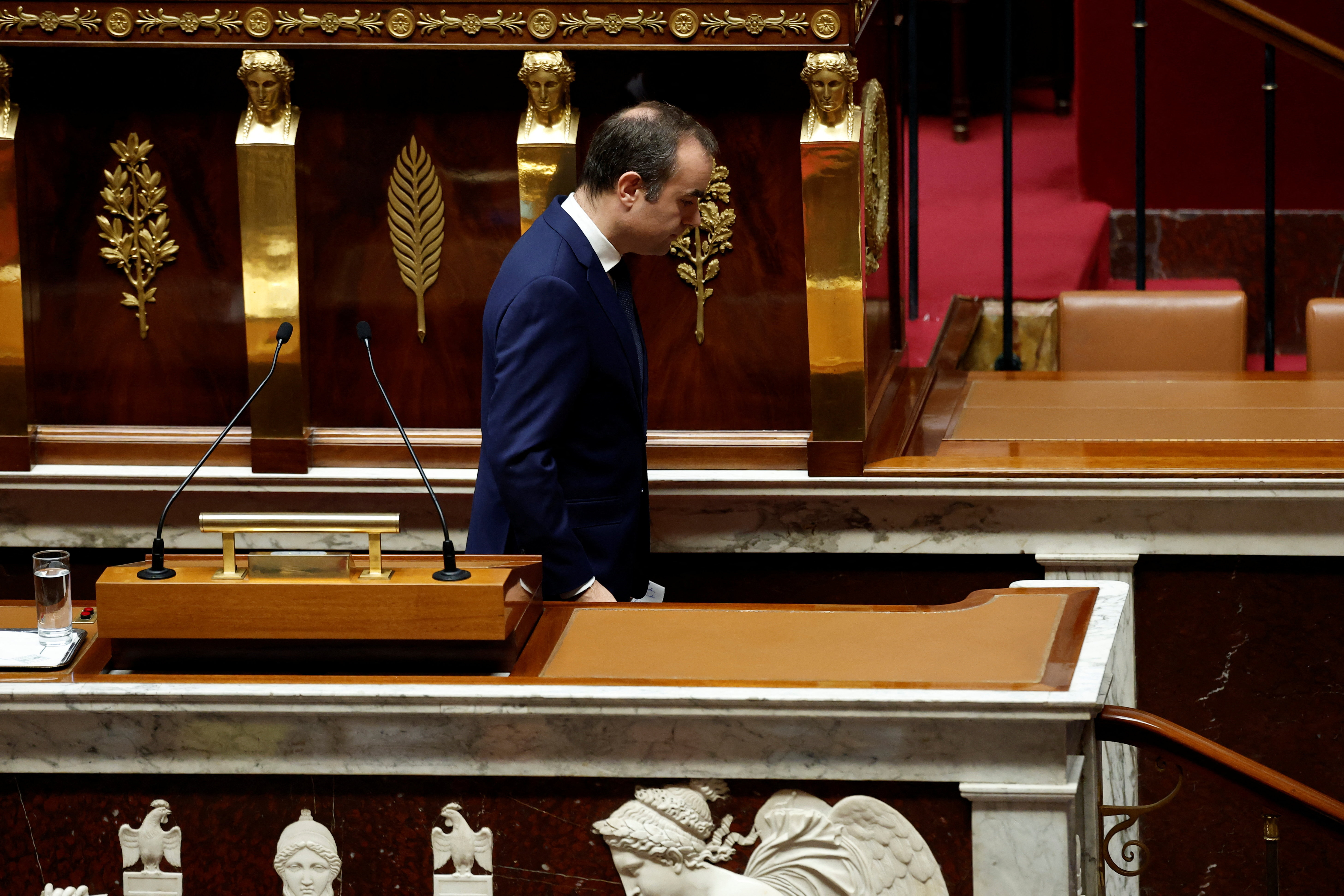 French parliament debates and votes two no-confidence motions against the new government