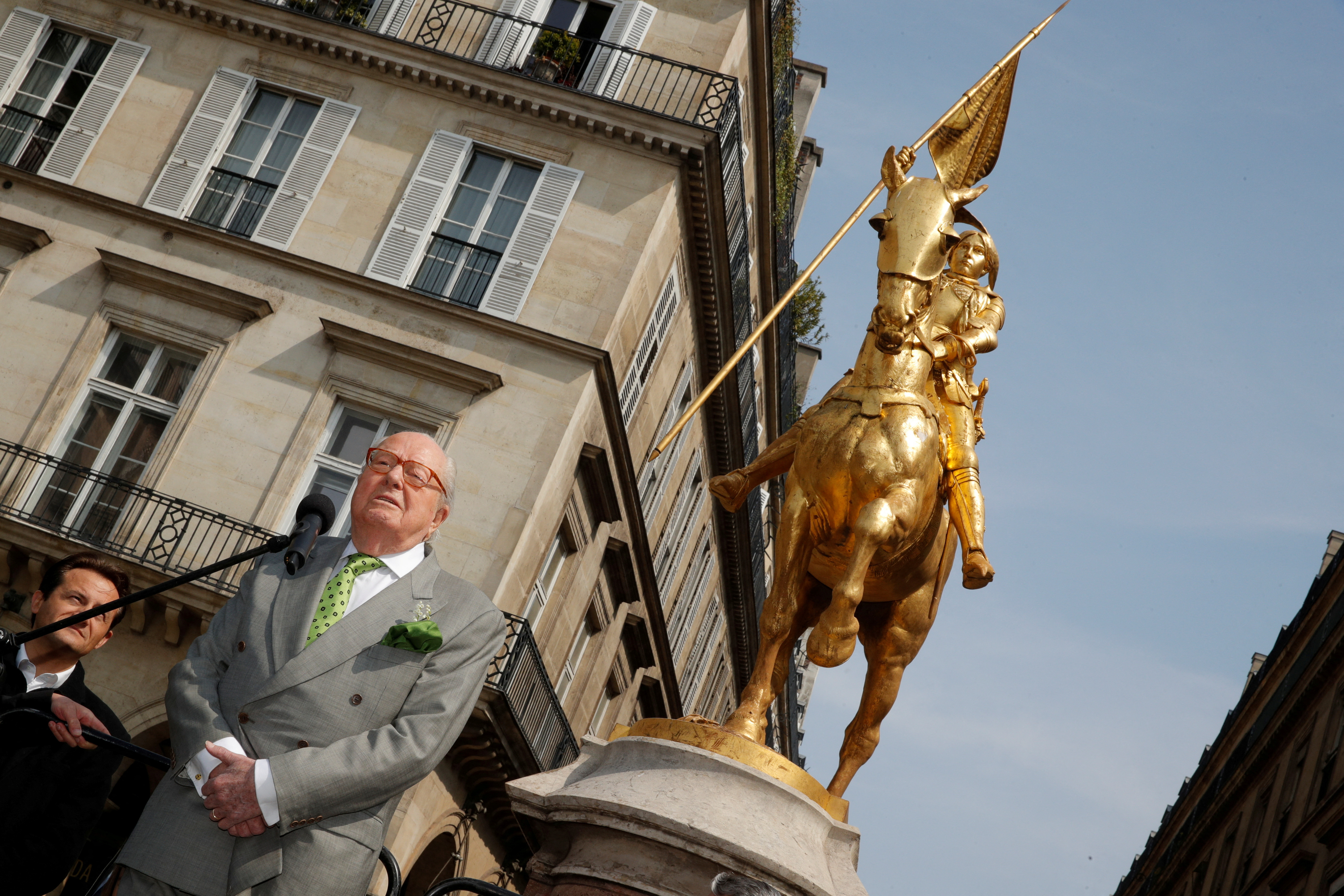 FILE PHOTO: French far-right National Front (FN) founder Jean-Marie Le Pen attends a May Day ceremony in front of the statue of Jeanne d'Arc (Joan of Arc) in Paris