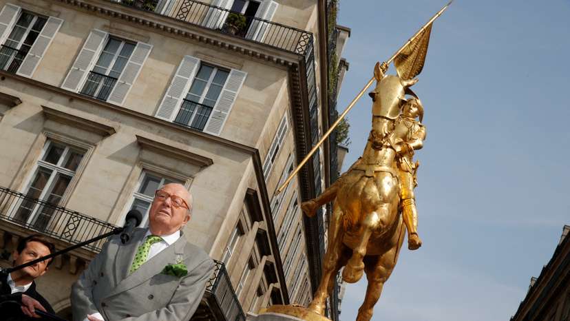 FILE PHOTO: French far-right National Front (FN) founder Jean-Marie Le Pen attends a May Day ceremony in front of the statue of Jeanne d'Arc (Joan of Arc) in Paris