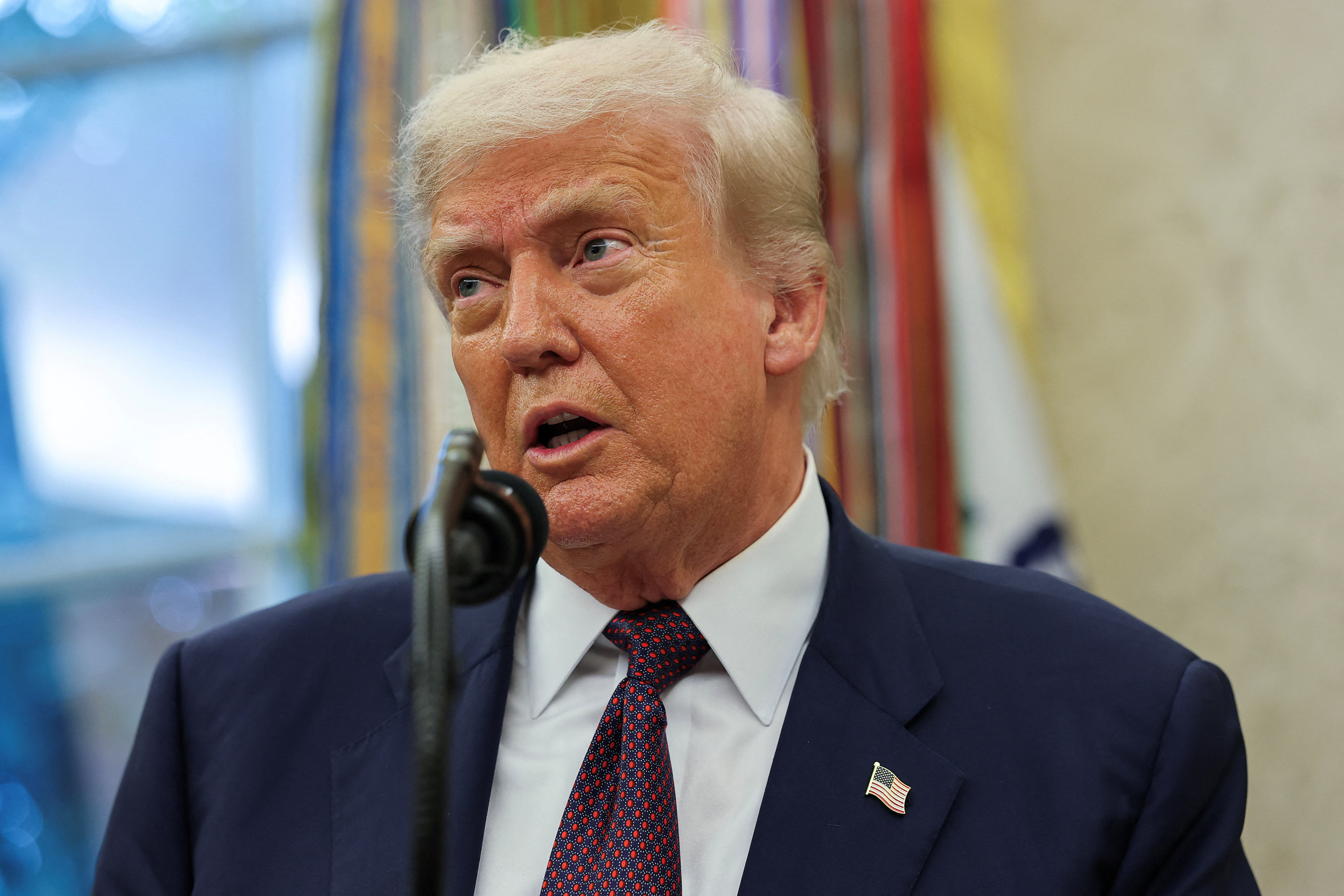 U.S. President Trump and Apple CEO Cook announce Apple's $100 billion investment in U.S. manufacturing, at the White House
