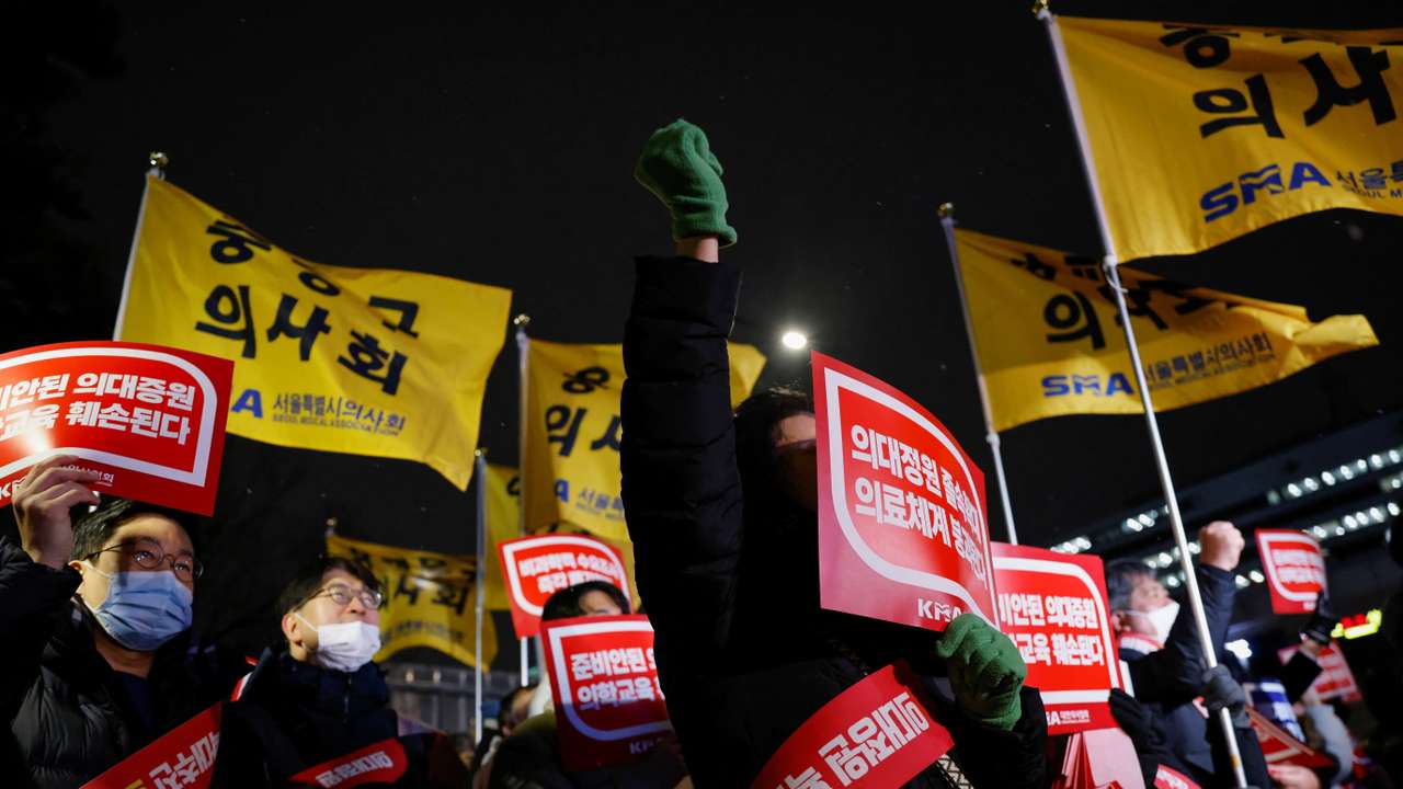 Doctors take part in a protest against a plan to admit more students to medical school, in front of the Presidential Office in Seoul