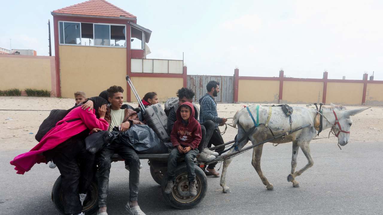 Palestinians fleeing north Gaza after Israeli troops raided Al Shifa hospital, move southward, in the central Gaza Strip