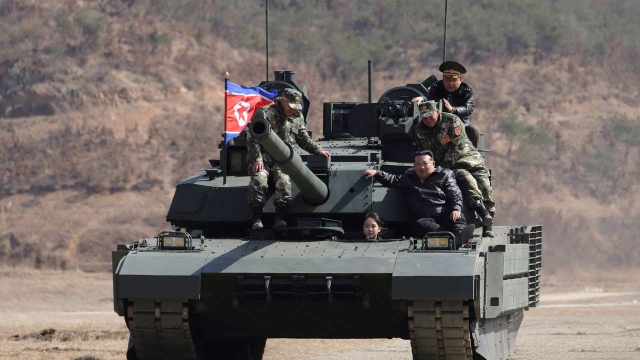 North Korean leader Kim Jong Un supervises what North Korean state news agency KCNA reports is an offensive tactical drill involving a new type of tank, at a training base in Pyongyang