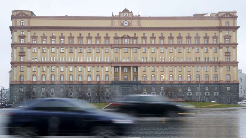 FILE PHOTO: Cars drive past the headquarters of the Federal Security Service (FSB) in central Moscow