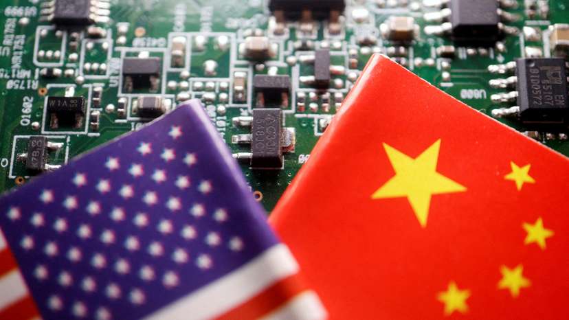 FILE PHOTO: Illustration picture of Chinese and U.S. flags with semiconductor chips
