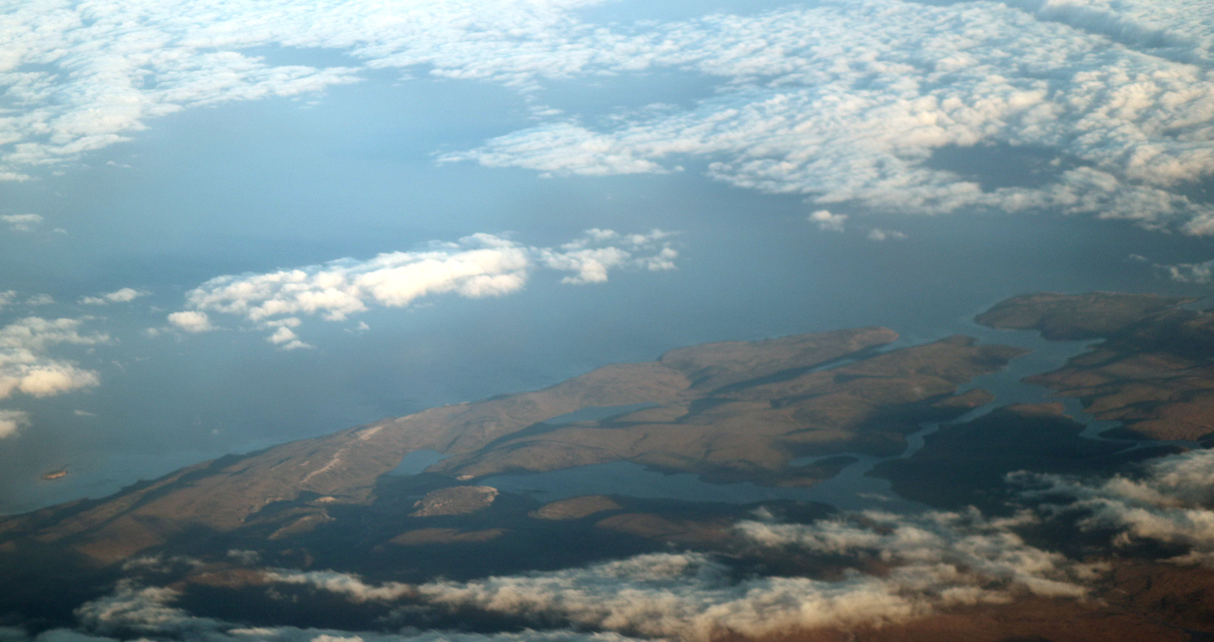 The coast of the West Falkland, of the Falkland Islands, is seen from an airplane