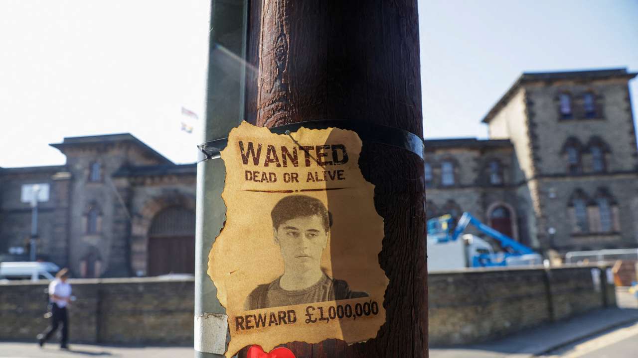 Police search for former soldier suspected of terrorism offences after prison escape, in London