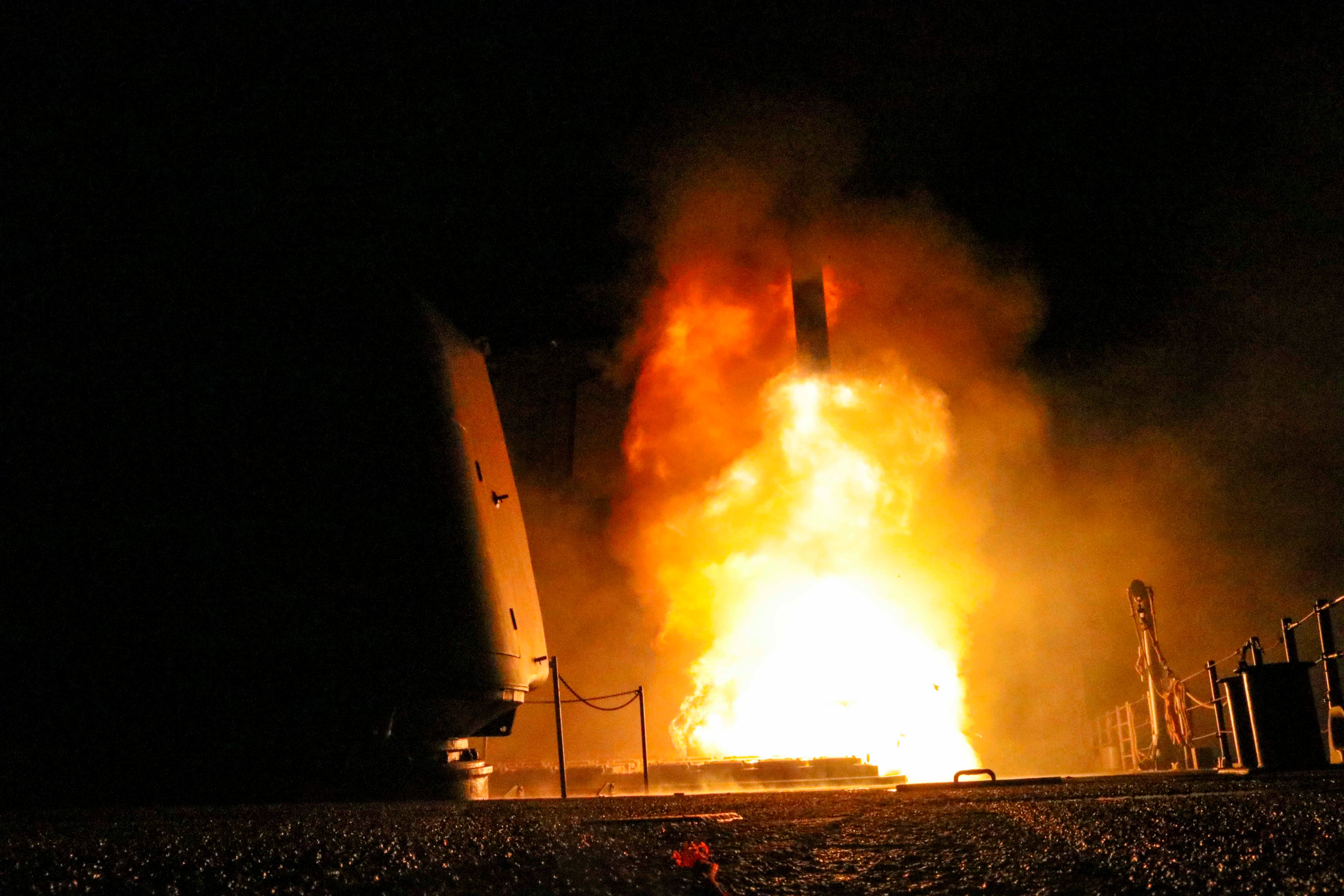The guided-missile cruiser USS Monterey fires a Tomahawk land attack missile