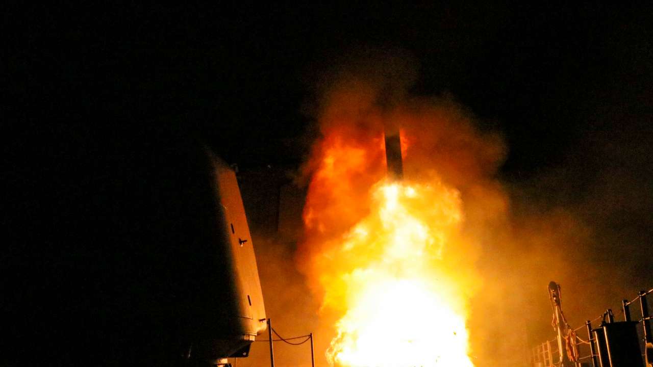 The guided-missile cruiser USS Monterey fires a Tomahawk land attack missile