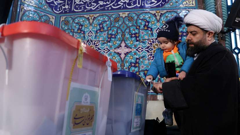FILE PHOTO: Iranians vote during parliamentary elections at a polling station in Tehran