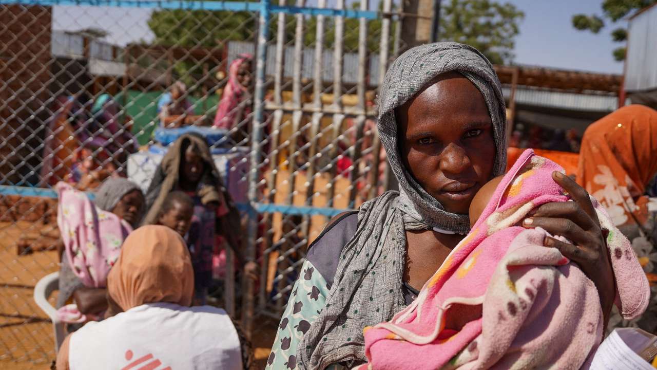 FILE PHOTO: Handout photograph of a woman and baby at the Zamzam displacement camp in North Darfur
