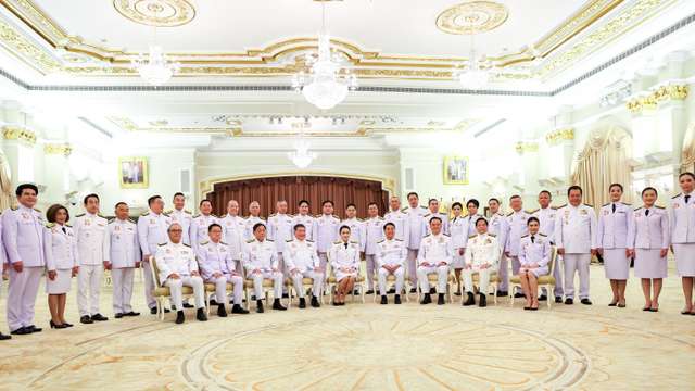 Thailand’s Prime Minister Paetongtarn Shinawatra leads her cabinet members to a royal oath-taking ceremony in Bangkok
