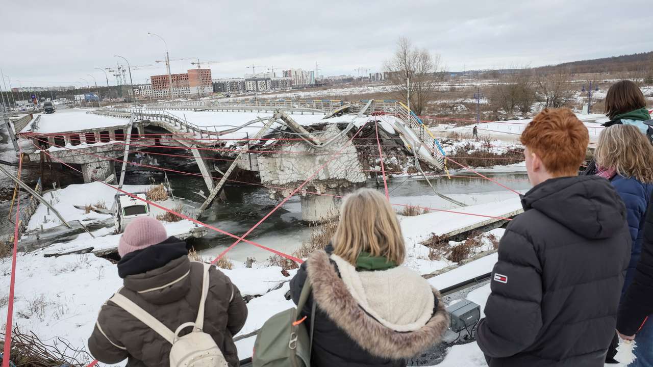 People attend a memorial event to mark the fourth anniversary of the full-scale Russian invasion in Irpin