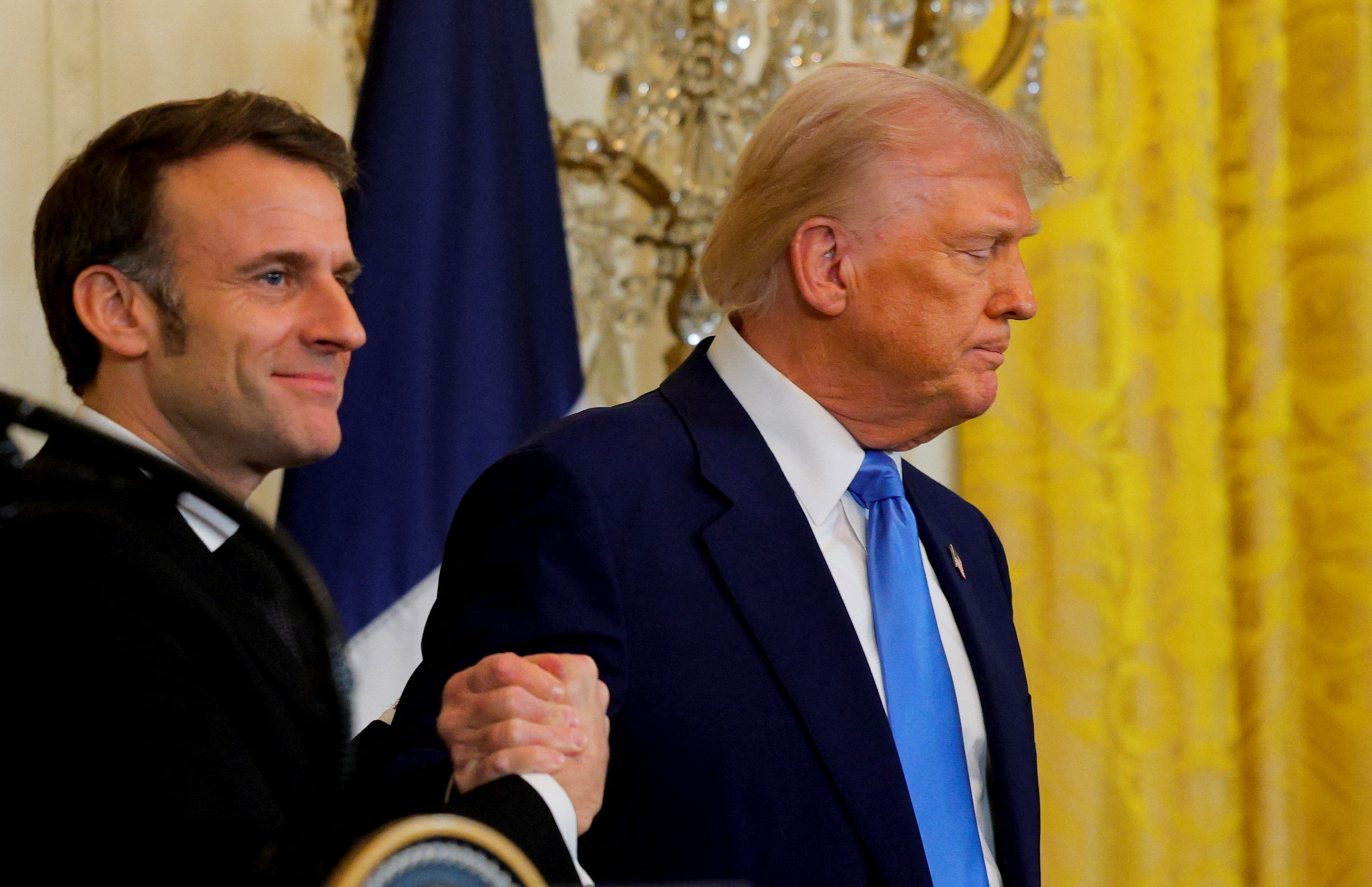 U.S. President Donald Trump and French President Emmanuel Macron attend a press conference at the White House in Washington