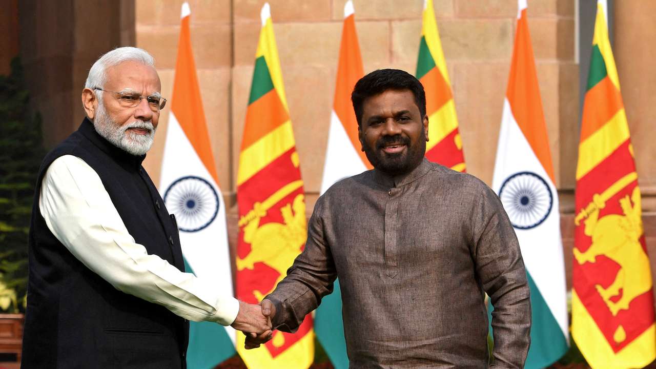 Sri Lanka's President Anura Kumara Dissanayake and India's PM Modi shake hands during a photo opportunity ahead of their meeting at Hyderabad House in New Delhi