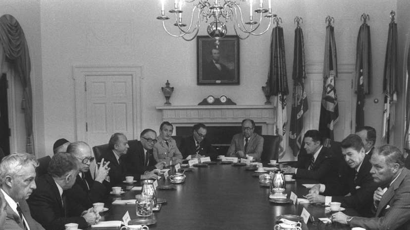 FILE PHOTO: File picture of US president Reagan meeting Israeli delegation including Israeli PM Begin and Defence Minister Sharon in Washington