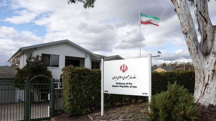 An Iranian flag flutters outside the Embassy of the Islamic Republic of Iran, in Canberra