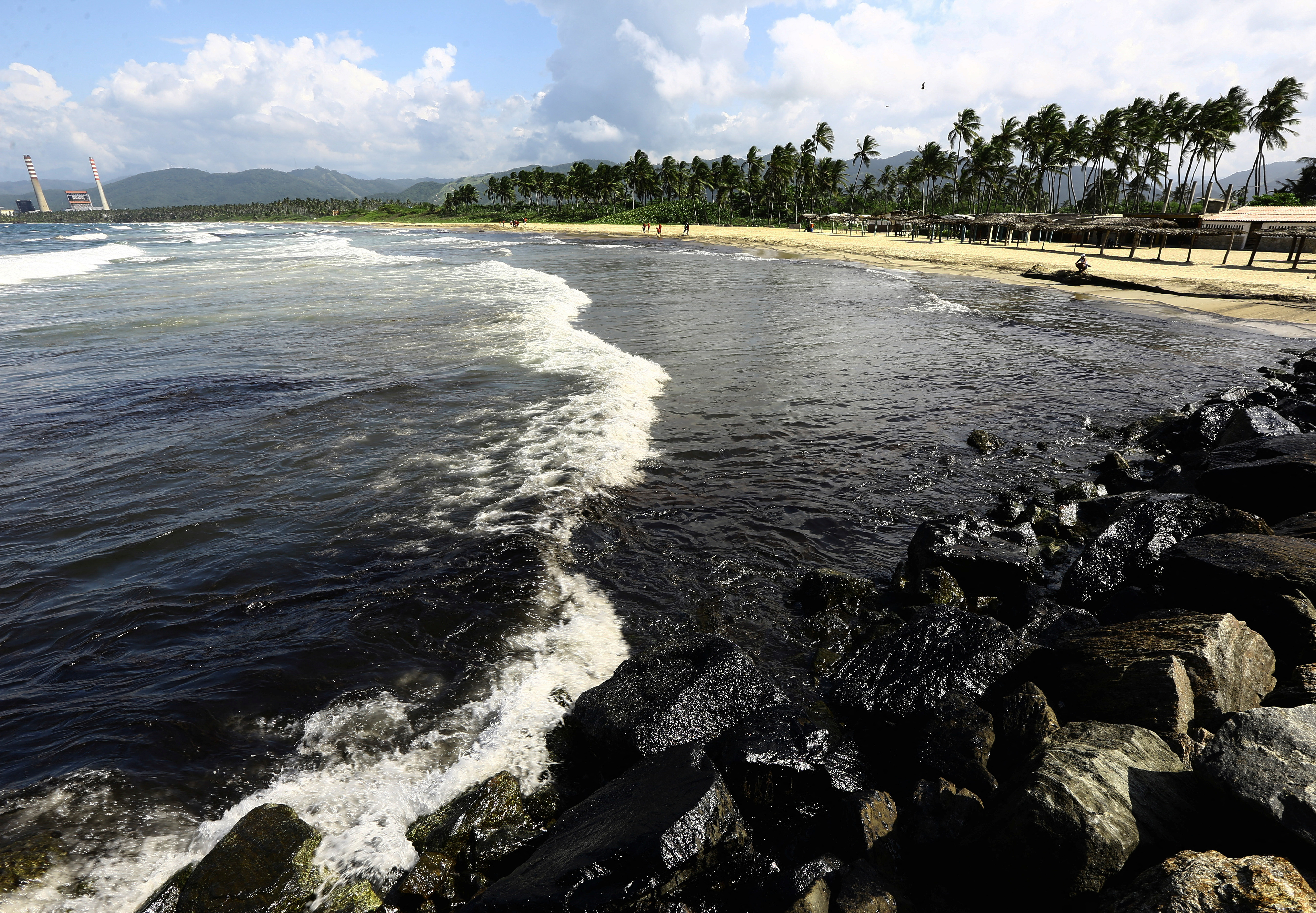 Oil spill on Venezuelan beach, in Boca de Aroa