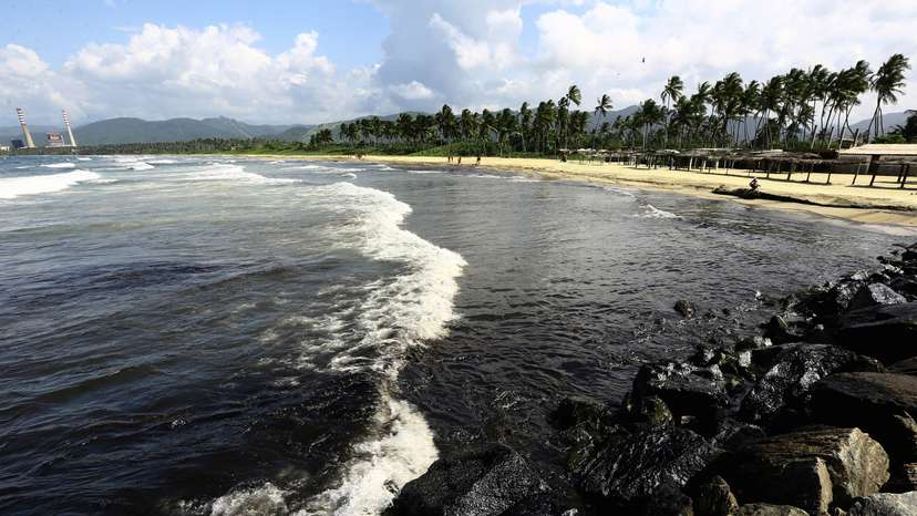 Oil spill on Venezuelan beach, in Boca de Aroa