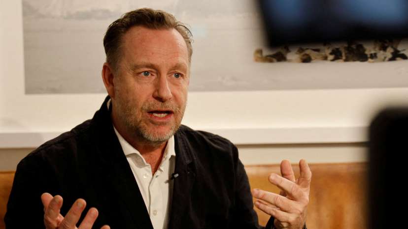 The screenwriter of "Borgen", Adam Price, talks during an interview with Reuters in Copenhagen