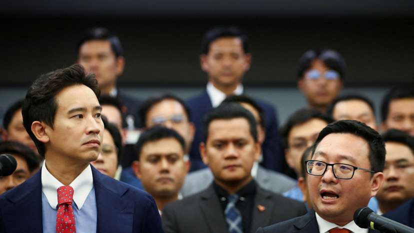 FILE PHOTO: Former Move Forward Party leader Limjaroenrat and Move Forward Party leader Tulathon react during a presser after Thailand's Constitutional Court delivered its verdict on the election winner's bid to amend a law against insulting the monarchy,