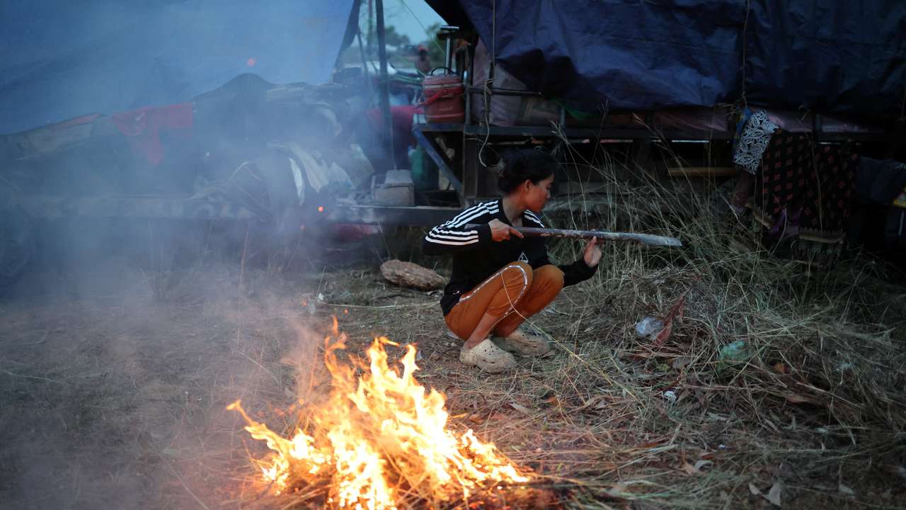 People gather at a refugee camp after evacuation, in Srei Snam