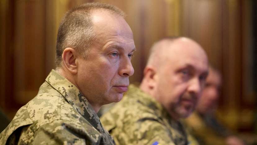 FILE PHOTO: Ukraine's President Zelenskiy attends a meeting with newly appointed top military commanders in Kyiv