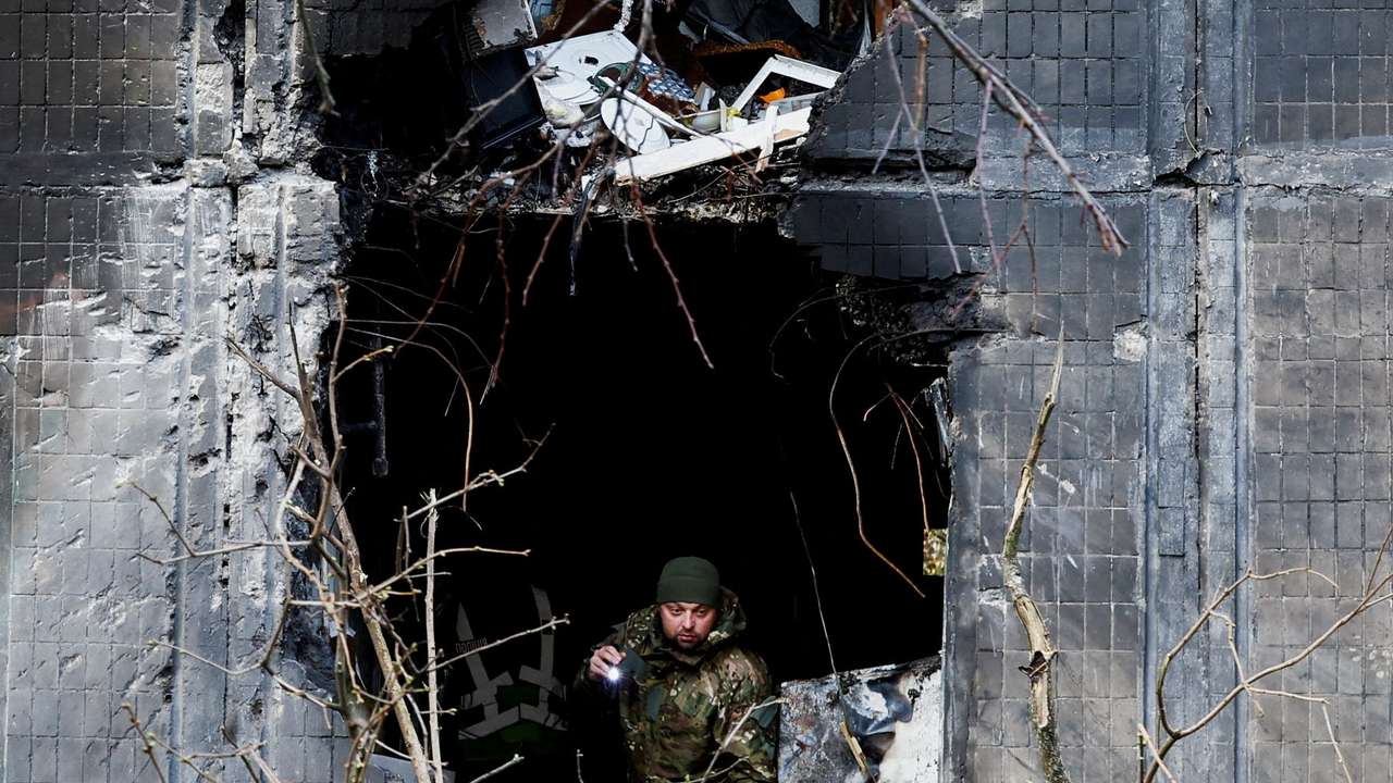 Aftermath of an overnight Russian drone and missile strike in Kyiv