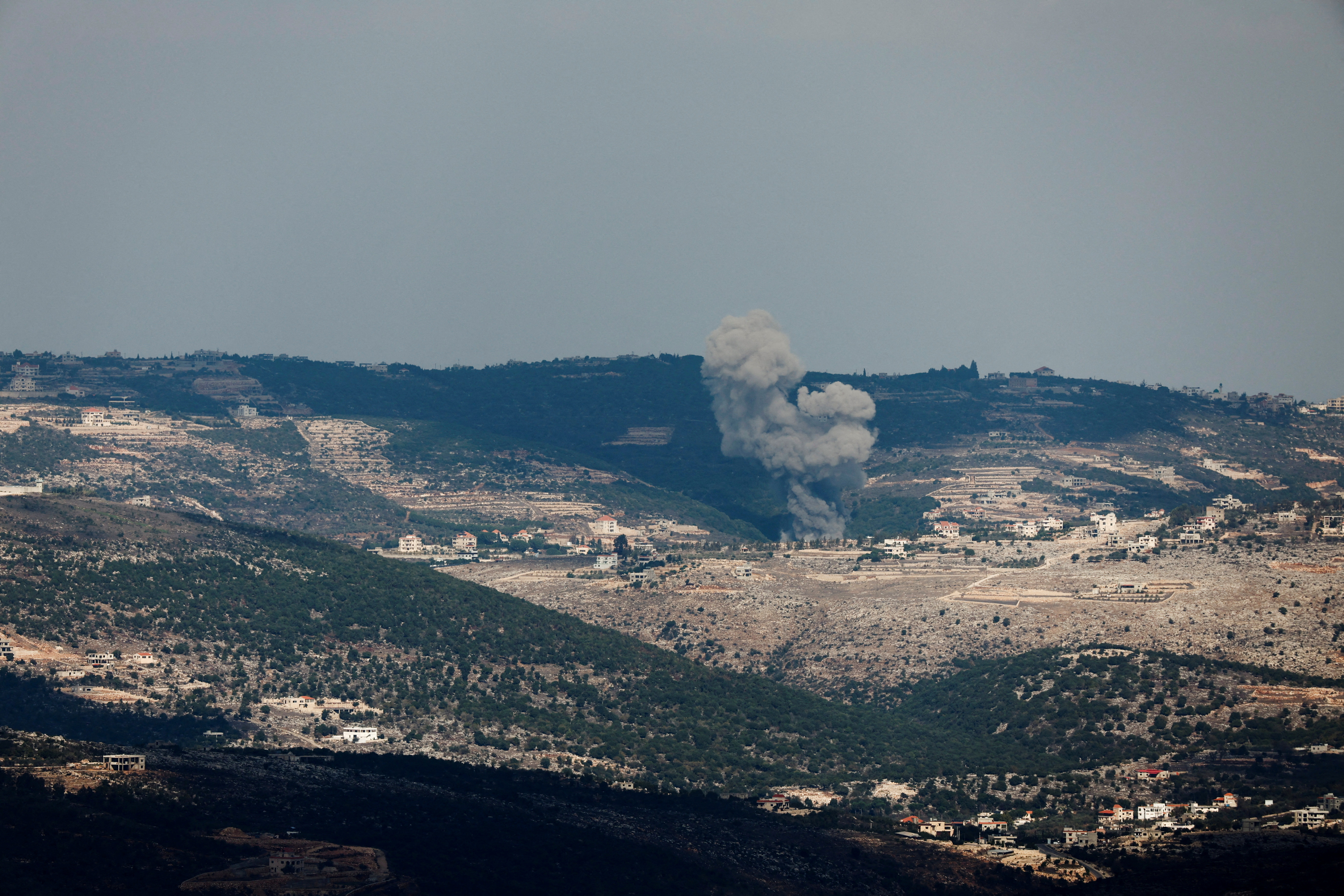 Smoke rises on the Lebanese side of the border between Israel and Lebanon after an Israeli airstrike, as seen from northern Israel