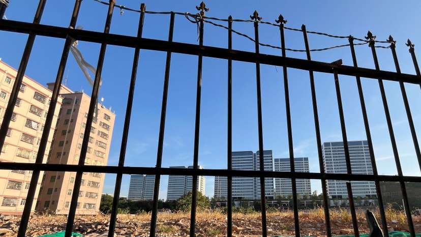 Weeds grow on a piece of land at an address identified on the U.S. entity list, in Shenzhen