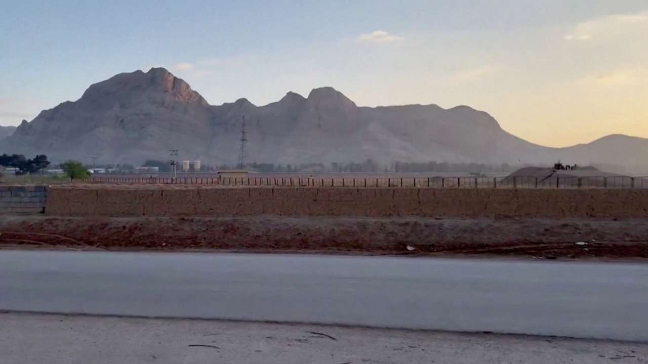 Military personnel stand guard at Iran's Isfahan nuclear facility
